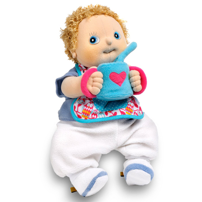 Rubens baby doll drinking from the blue plush cup of the feeding kit