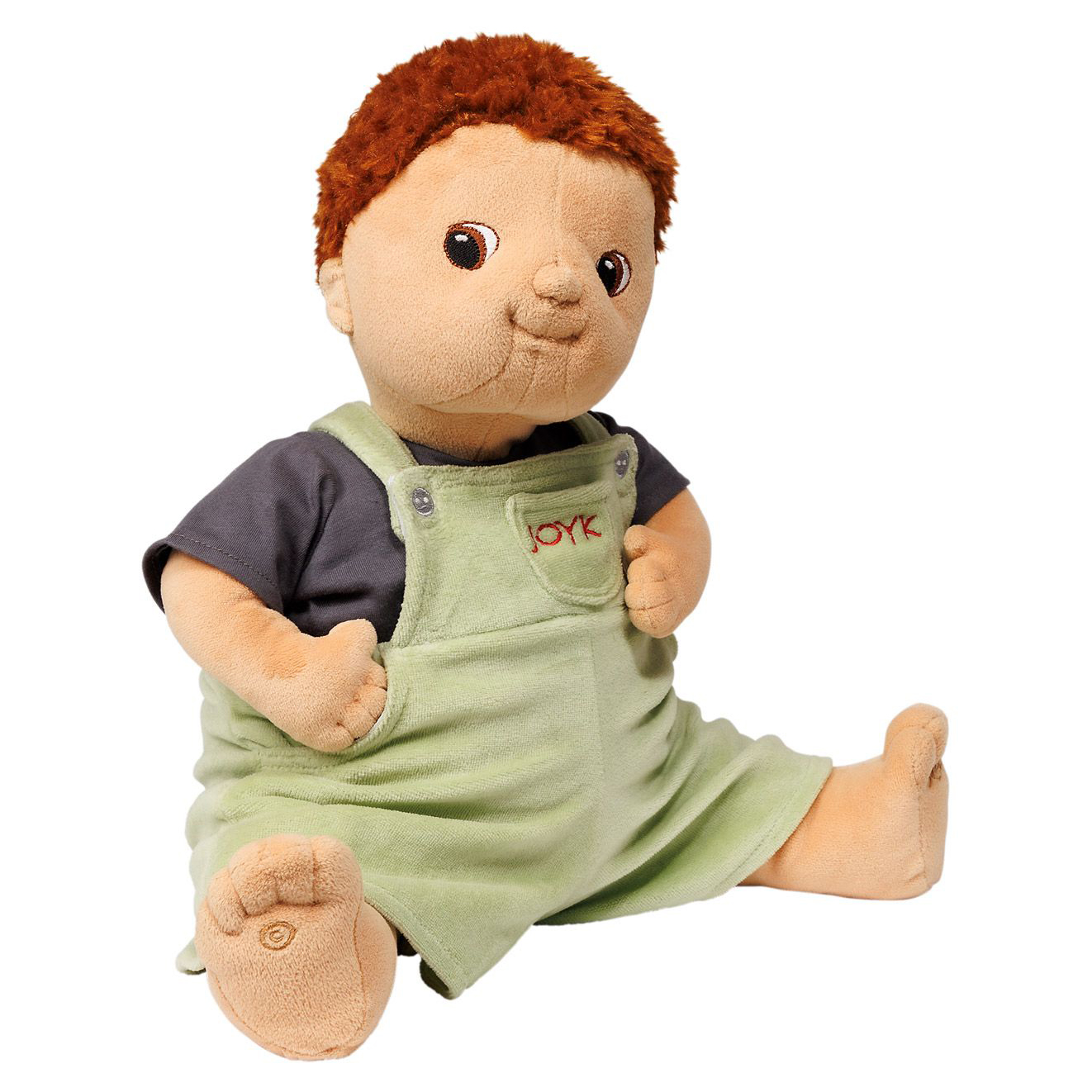 Joyk empathy doll Tom sitting with a hand at the light green dungarees