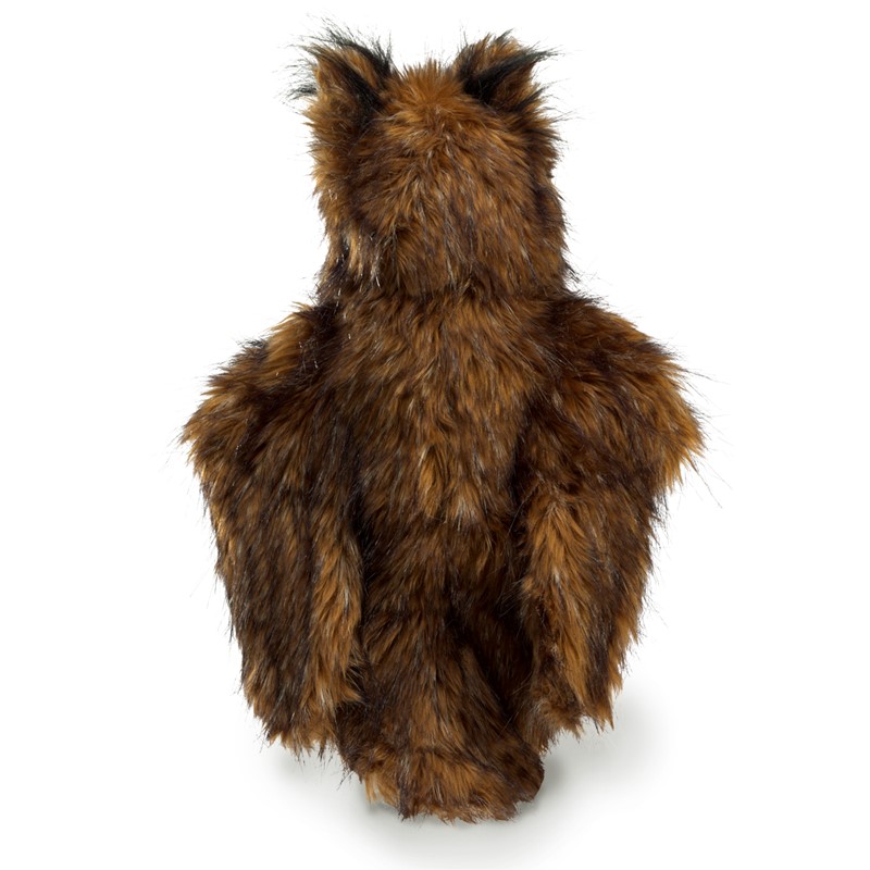 Folkmanis great horned owl hand puppet seen from behind with dark brown and rust-coloured long-pile plush and pointed ears