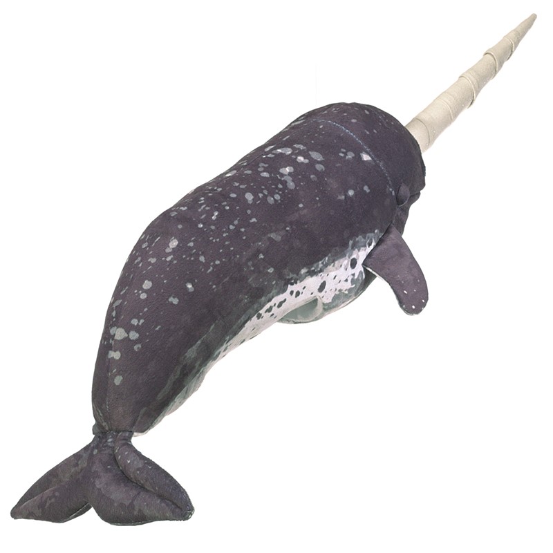 Folkmanis narwhal hand puppet in dark grey with white spots and a long twisted tusk, side view