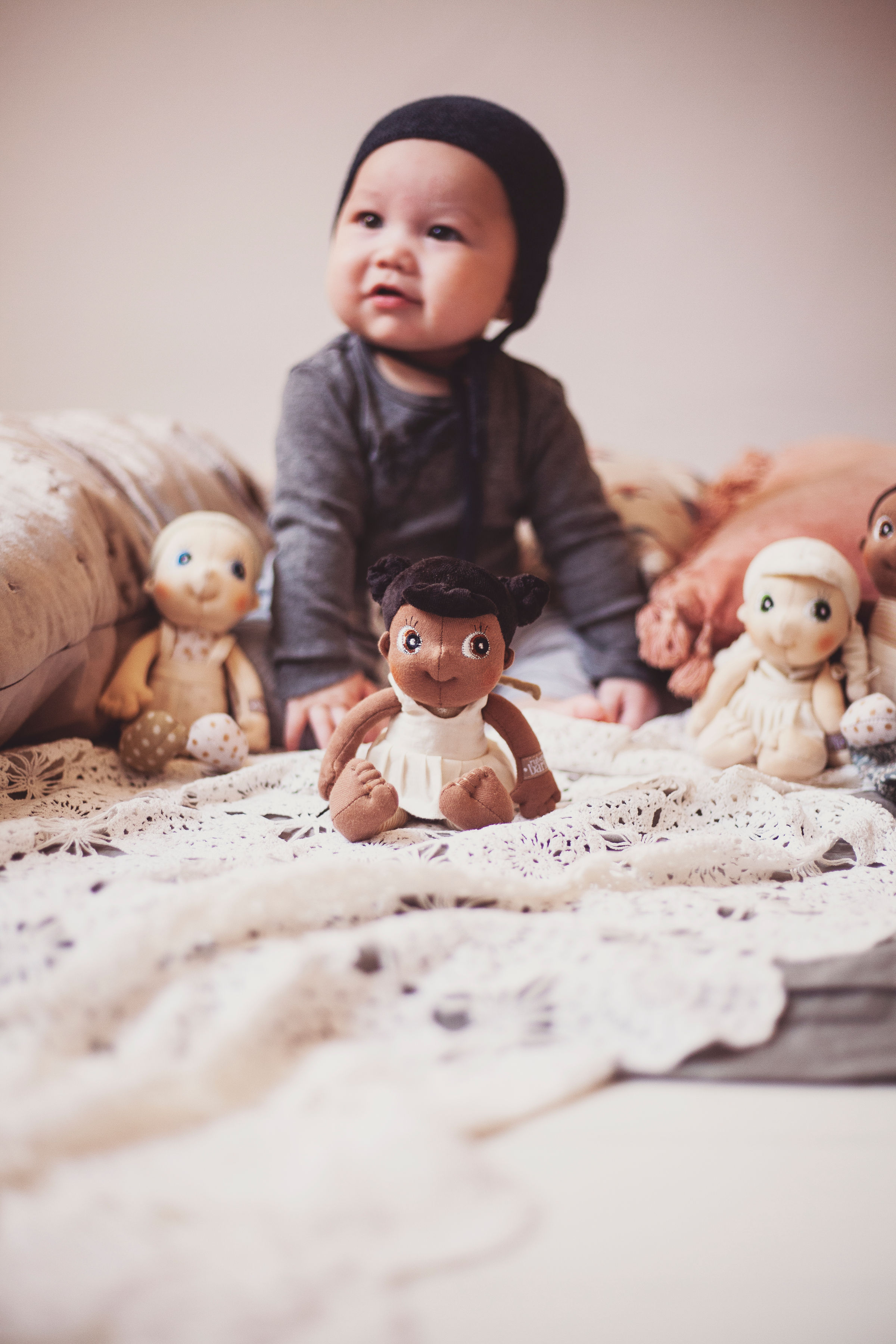 Baby with the Rubens EcoBuds mini dolls, Flora in the foreground