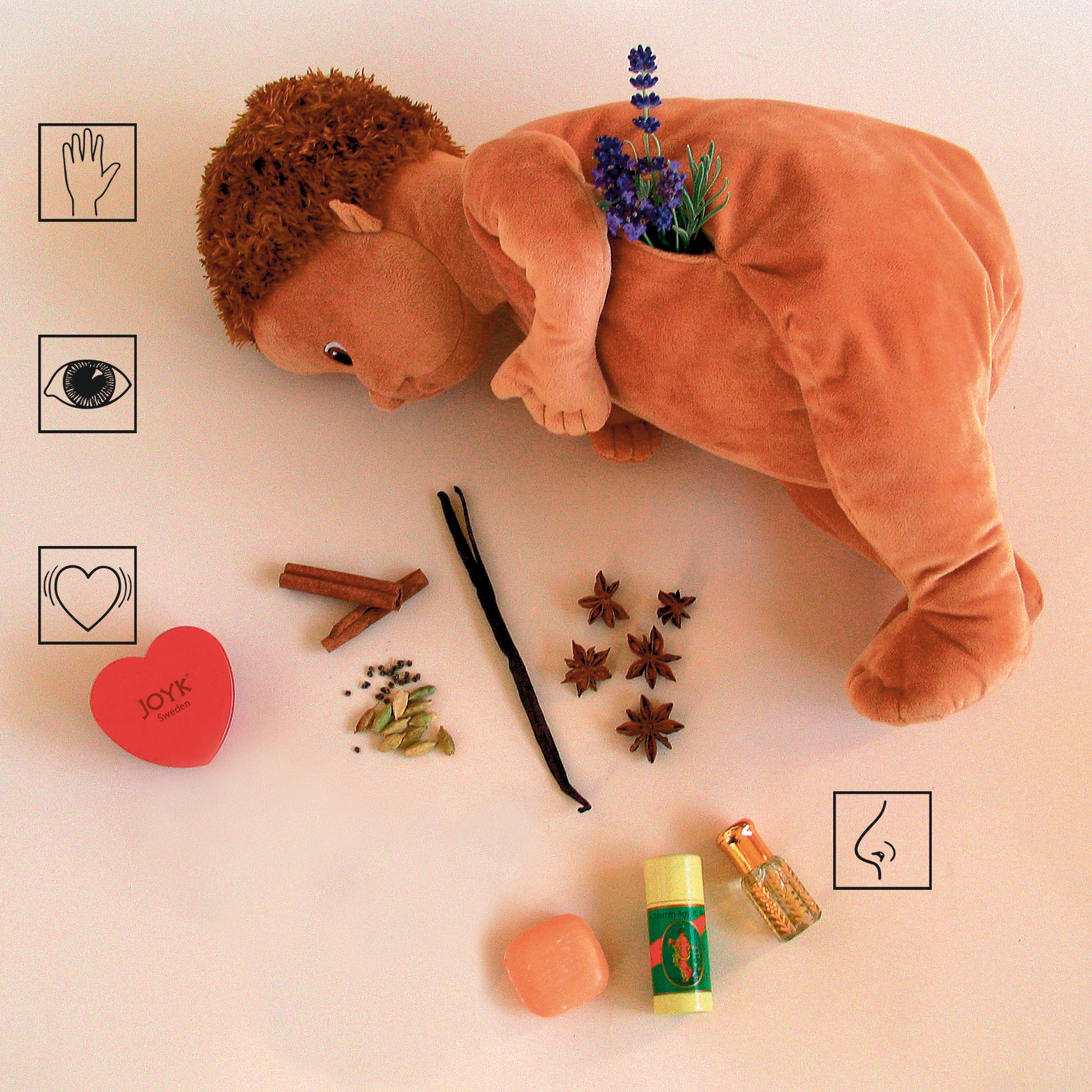Joyk empathy doll on its front with scent pouch, scent materials and heartbeat simulator