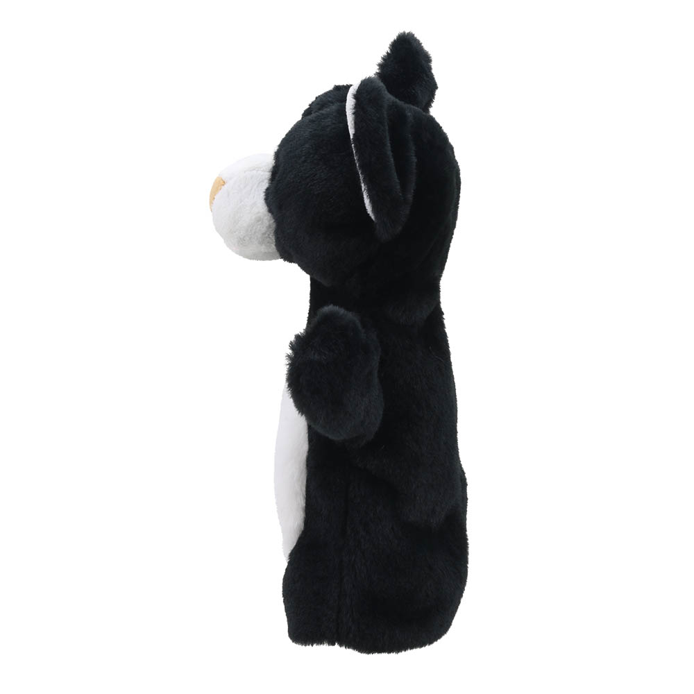 The Puppet Company baby hand puppet cat, black cat with a white muzzle, side view
