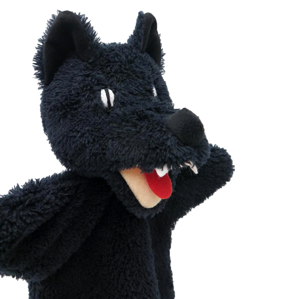 Punch and Judy puppet wolf in black by munabo with shaggy fur, pointed teeth and red tongue, close-up