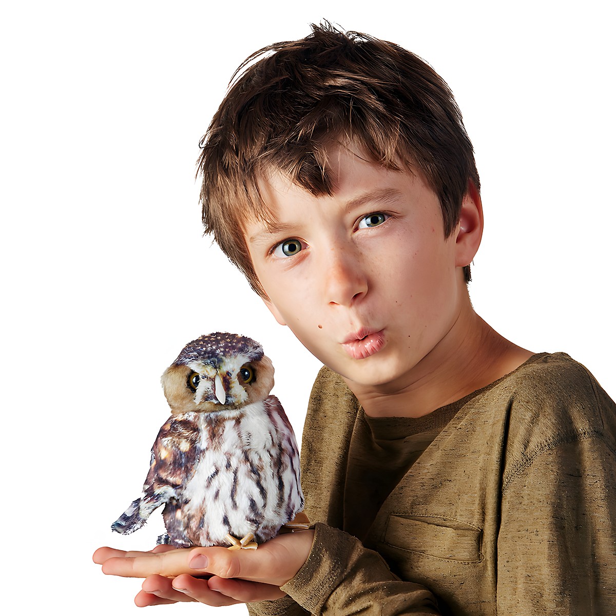 Boy holding a Folkmanis pygmy owl hand puppet on his open palm, brown and white spotted with detailed feathers