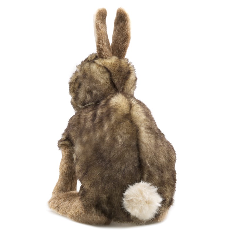 Folkmanis hand puppet cottontail rabbit seen from behind with brown mottled fur and white fluffy tail
