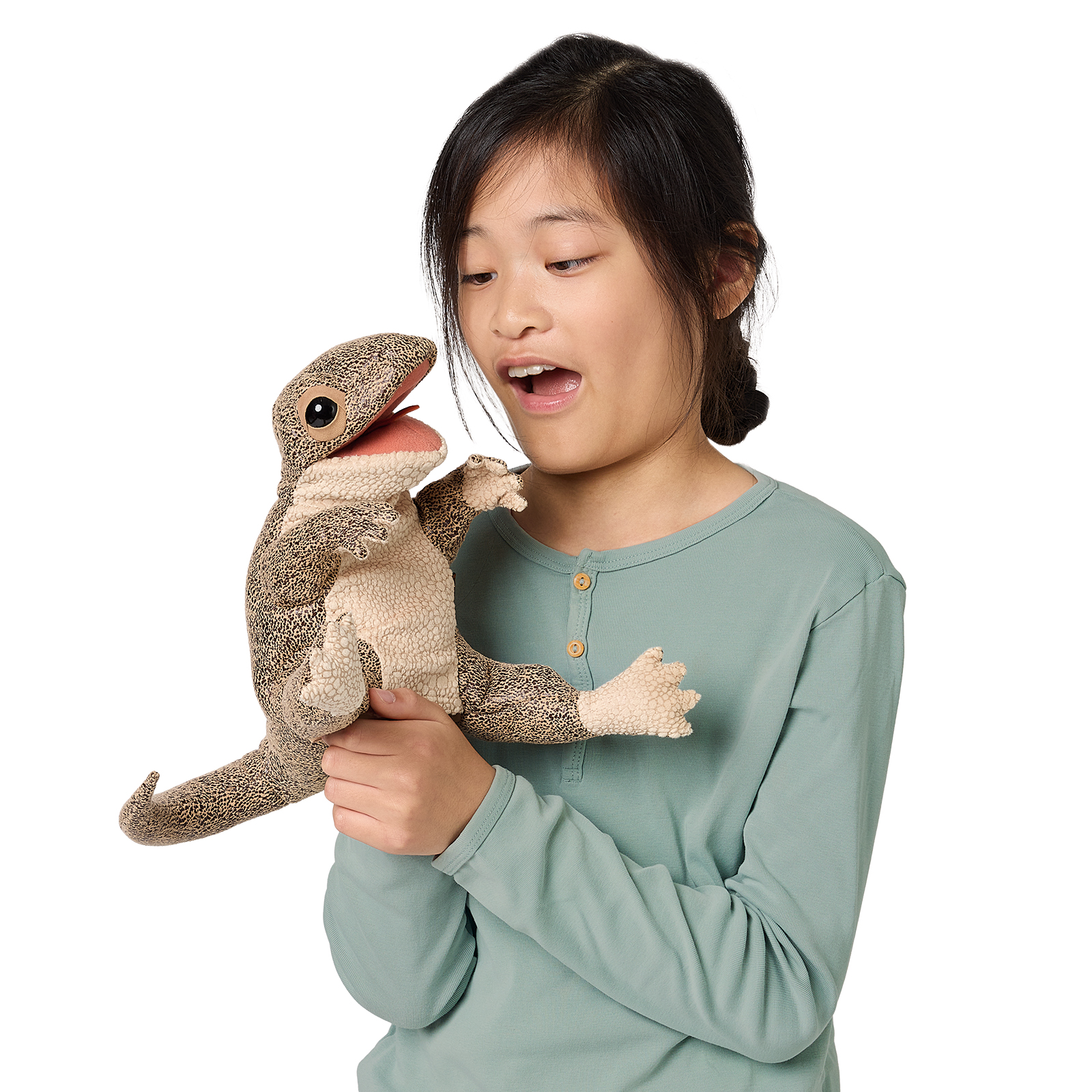Girl operating a Folkmanis lizard hand puppet with a brown-beige scale pattern and open mouth