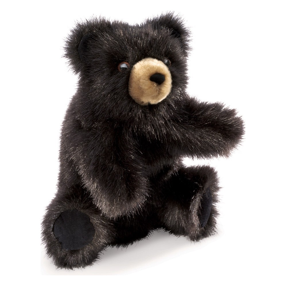Folkmanis Handpuppe kleiner Schwarzbär mit schwarzem Plüschfell und beigem Schnauzenbereich, sitzend mit ausgestreckter Pfote
