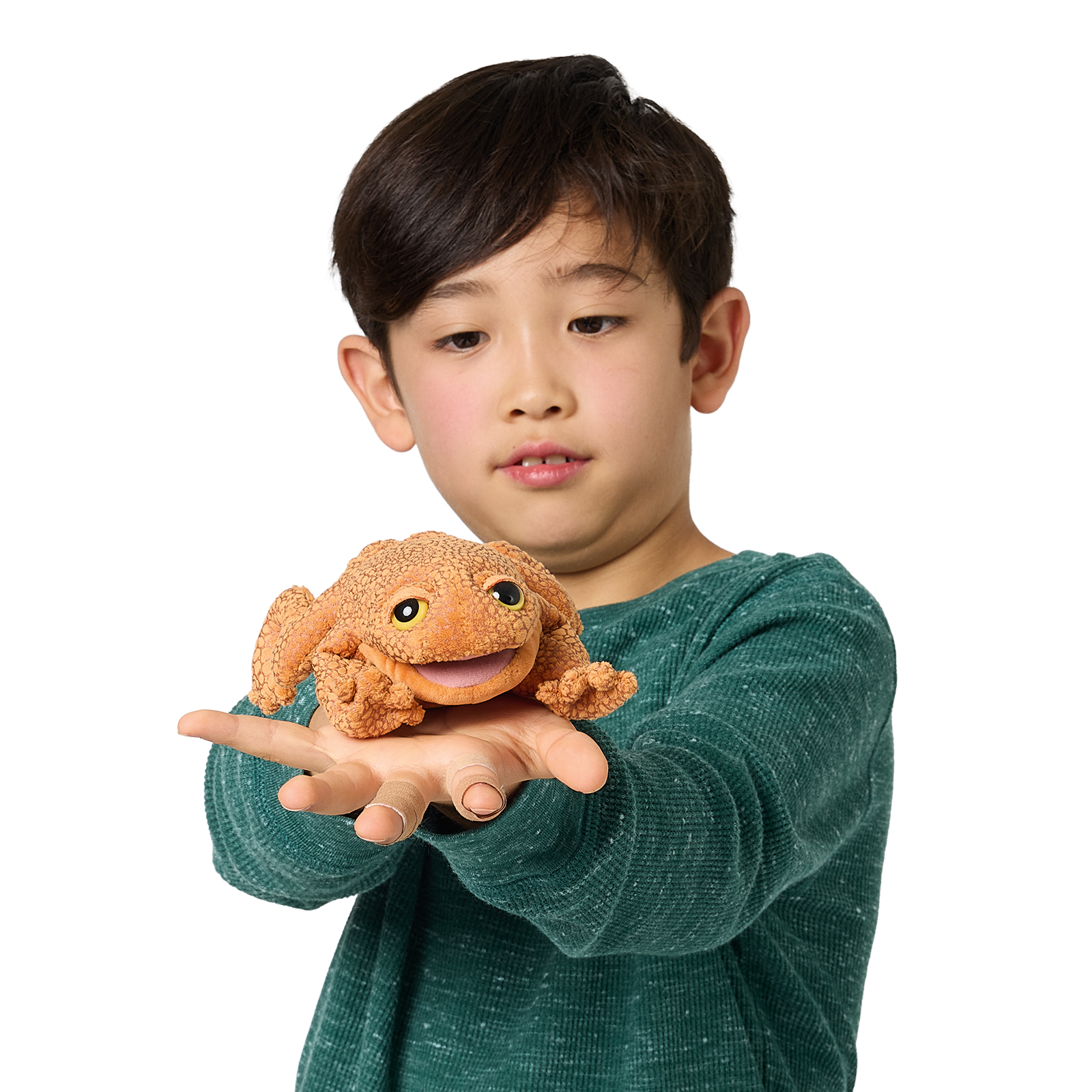 Folkmanis Mini-Fingerpuppe Kröte in Orangebraun mit strukturierter Oberfläche, auf Kinderhand präsentiert