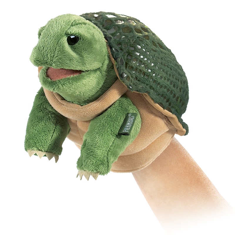 Folkmanis small turtle hand puppet with green mesh shell and movable mouth, shown on a hand