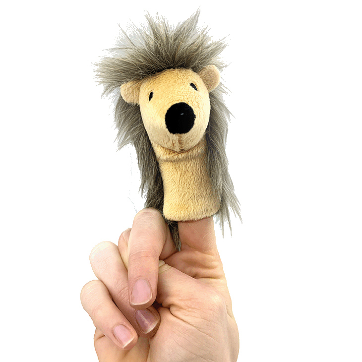 Beleduc finger puppet hedgehog with a beige face and grey-brown spiky fur, on an index finger, usage example