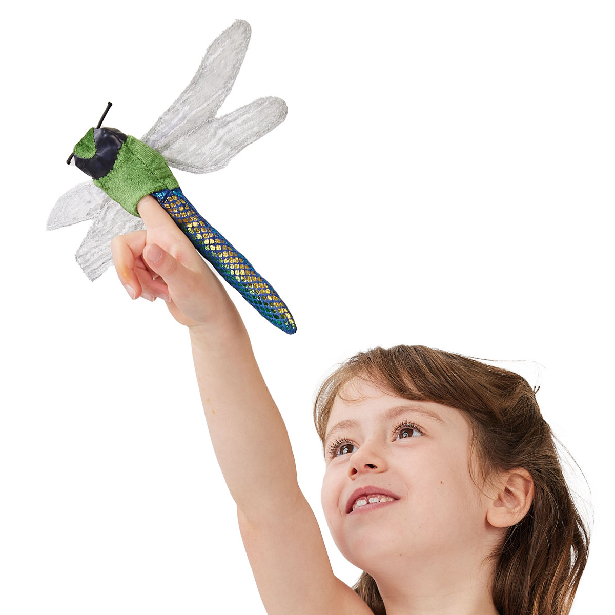 Girl reaching her arm up high with the Folkmanis mini dragonfly finger puppet on her index finger, blue-green body with a shimmering mesh pattern and transparent wings