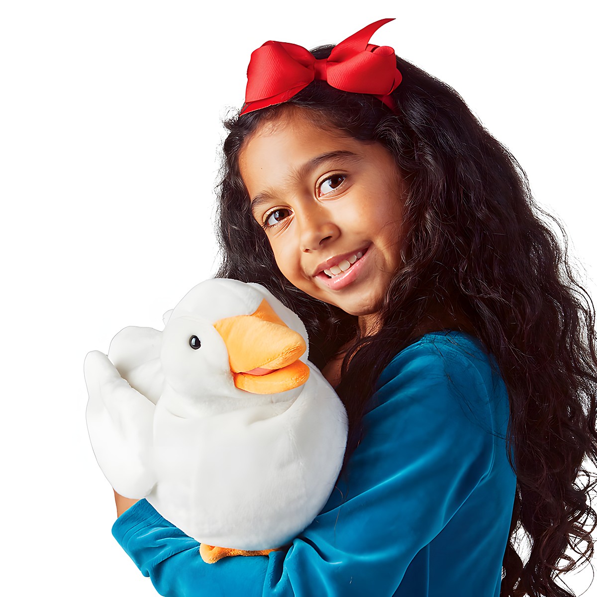 Girl in a teal top holding a white Folkmanis duck hand puppet with an orange beak in her arms