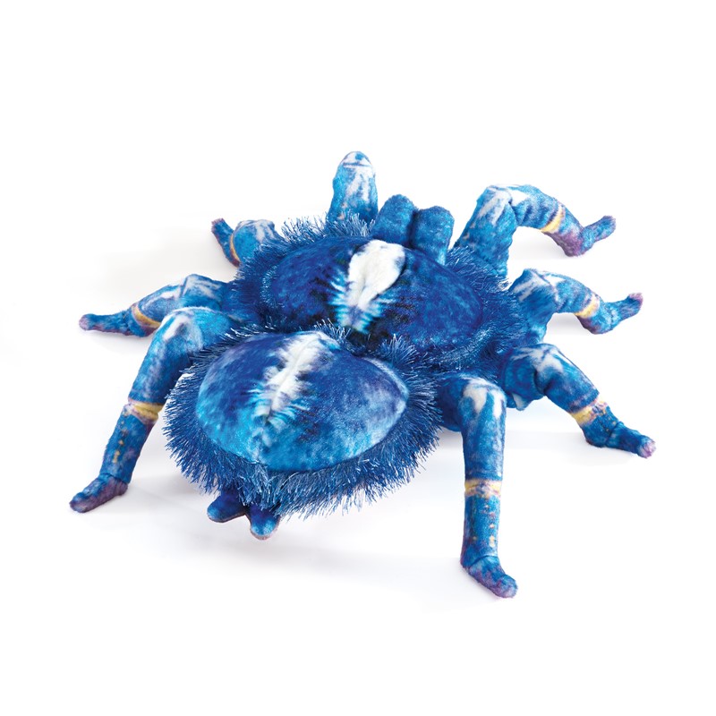 Folkmanis hand puppet blue ornament tarantula with blue and white fur pattern and eight jointed legs, angled view