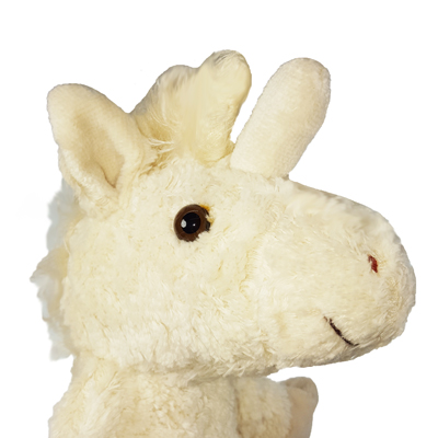 Kallisto hand puppet unicorn, close-up of the face with cream fur, a horn and red nostrils