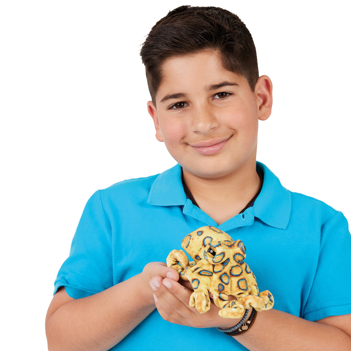 Boy holding a small Folkmanis mini blue-ringed octopus finger puppet in beige-yellow plush with blue rings on his palm