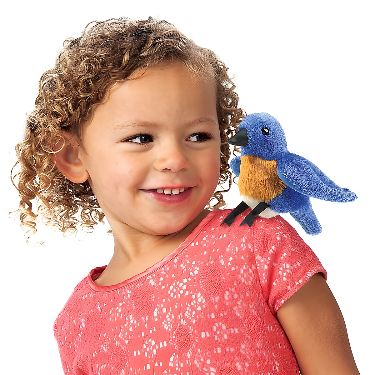 Folkmanis mini bluebird finger puppet in blue and orange sitting on the shoulder of a smiling girl