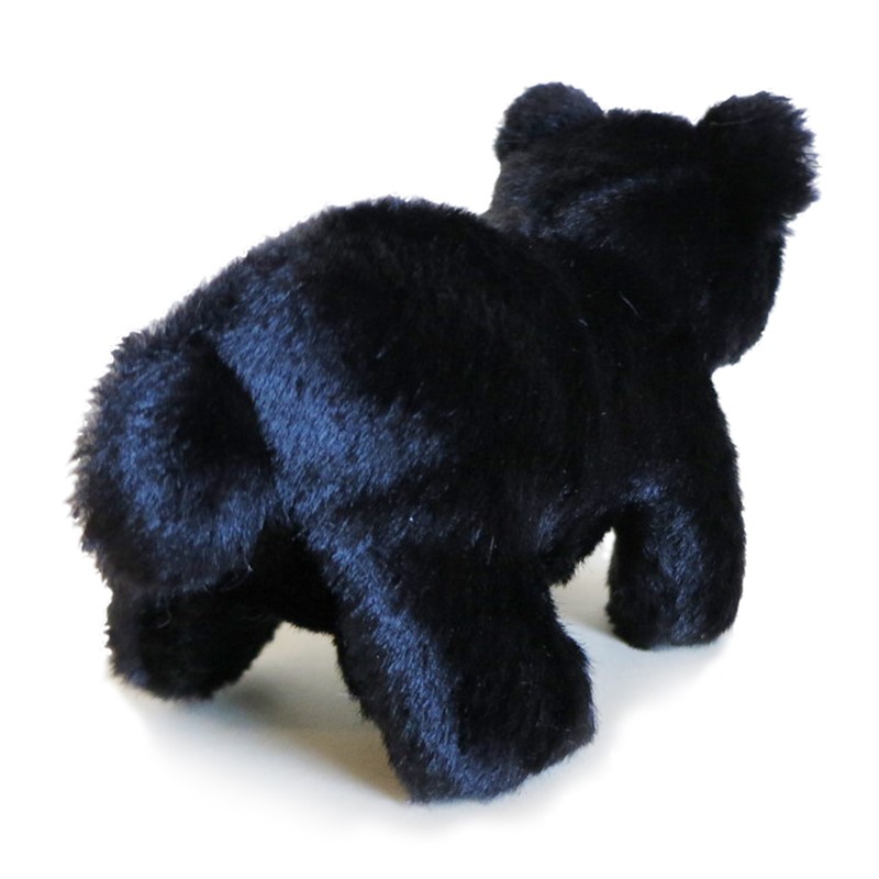 Folkmanis mini black bear finger puppet in black plush, standing shown at an angle from behind