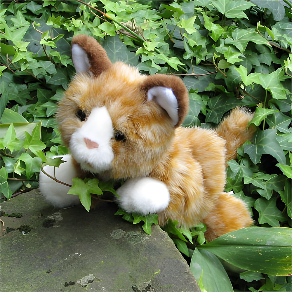 Living Puppets hand puppet brown cat lying among ivy in the garden