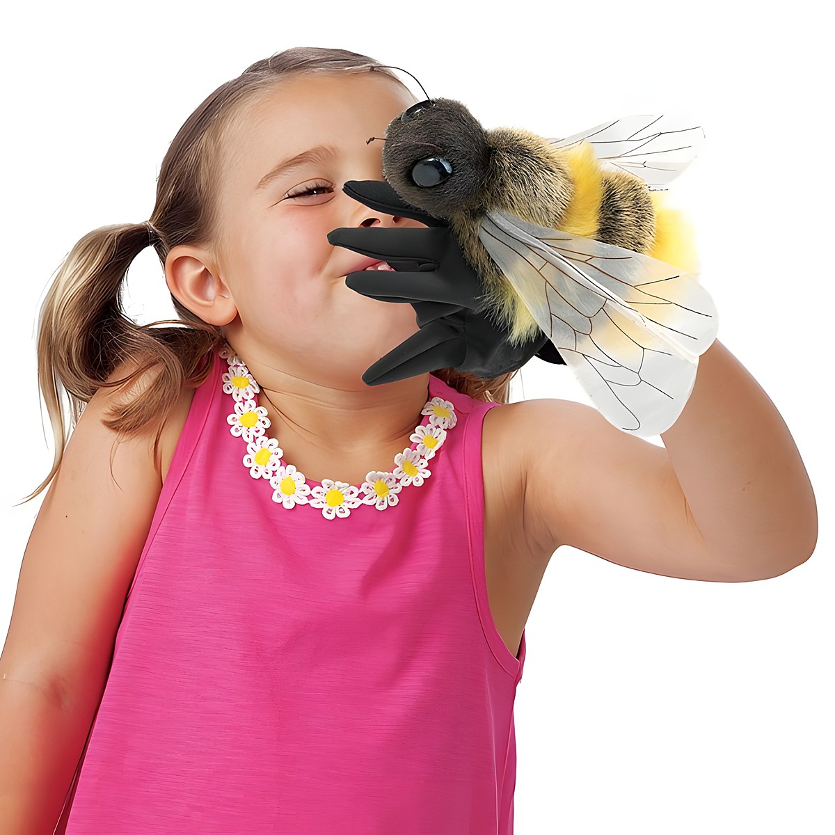 Girl holding a Folkmanis bee hand puppet with a black glove, yellow-black plush body and transparent wings up to her face