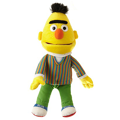 Living Puppets Handpuppe Mini Bert aus der Sesamstraße mit gelbem Kopf, schwarzer Augenbraue, gestreifter Jacke und grüner Hose