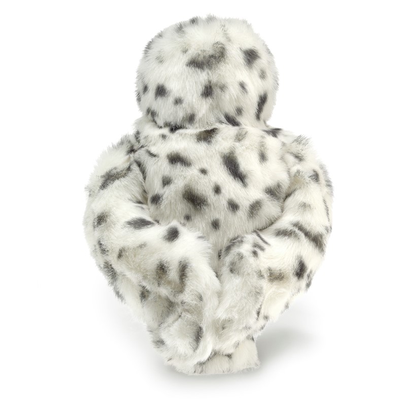 Folkmanis snowy owl hand puppet seen from behind: white plush feathers with dark grey spots, compact round shape