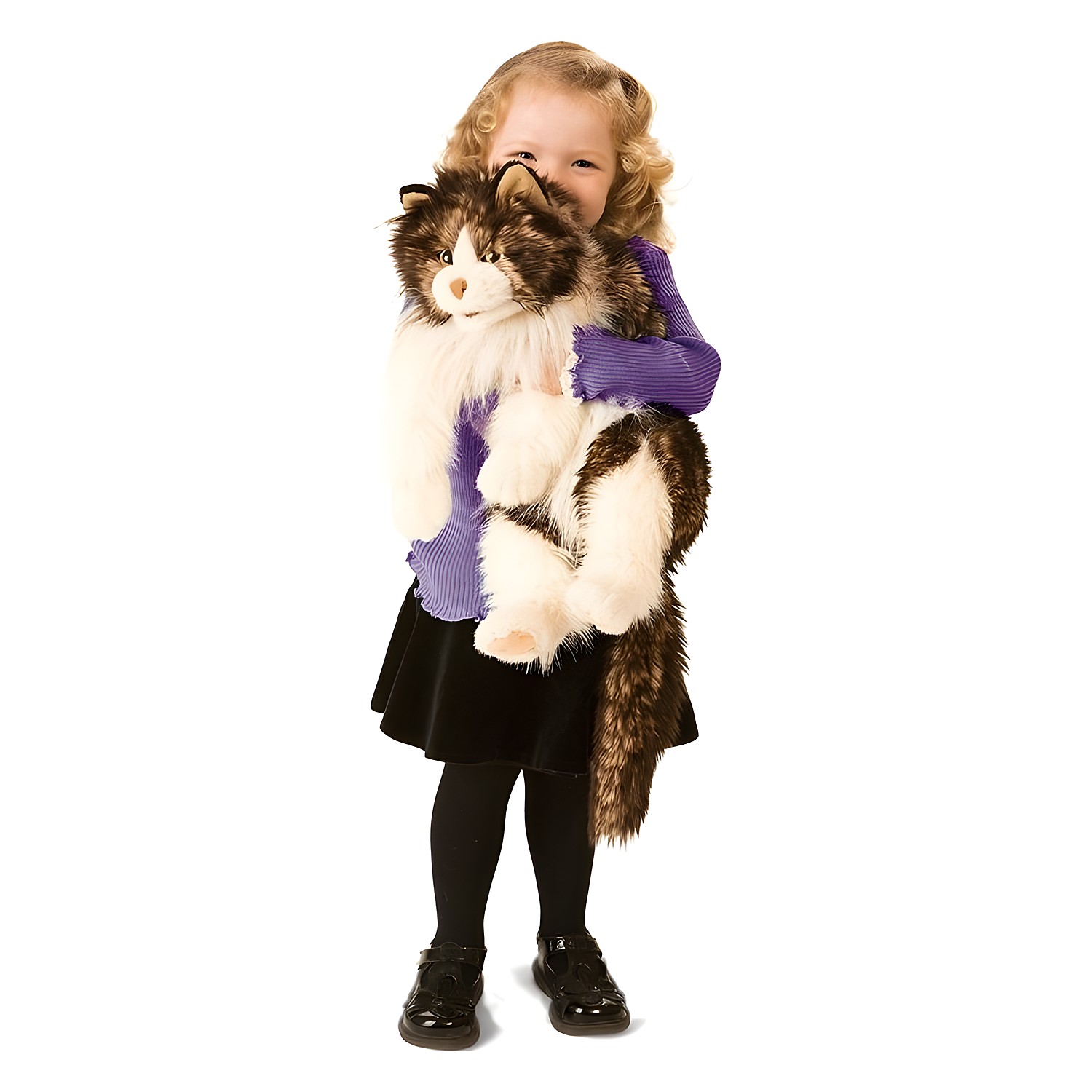 Small girl holding a large Folkmanis hand puppet fluffy cat with brown and white fur in her arms
