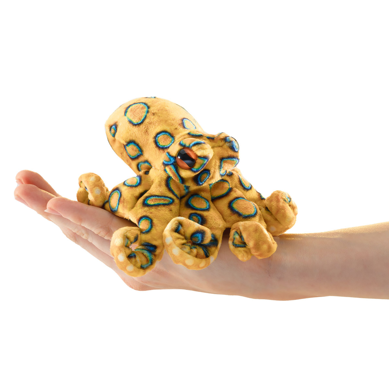 Folkmanis mini finger puppet blue-ringed octopus in golden yellow with blue rings, lying on a palm