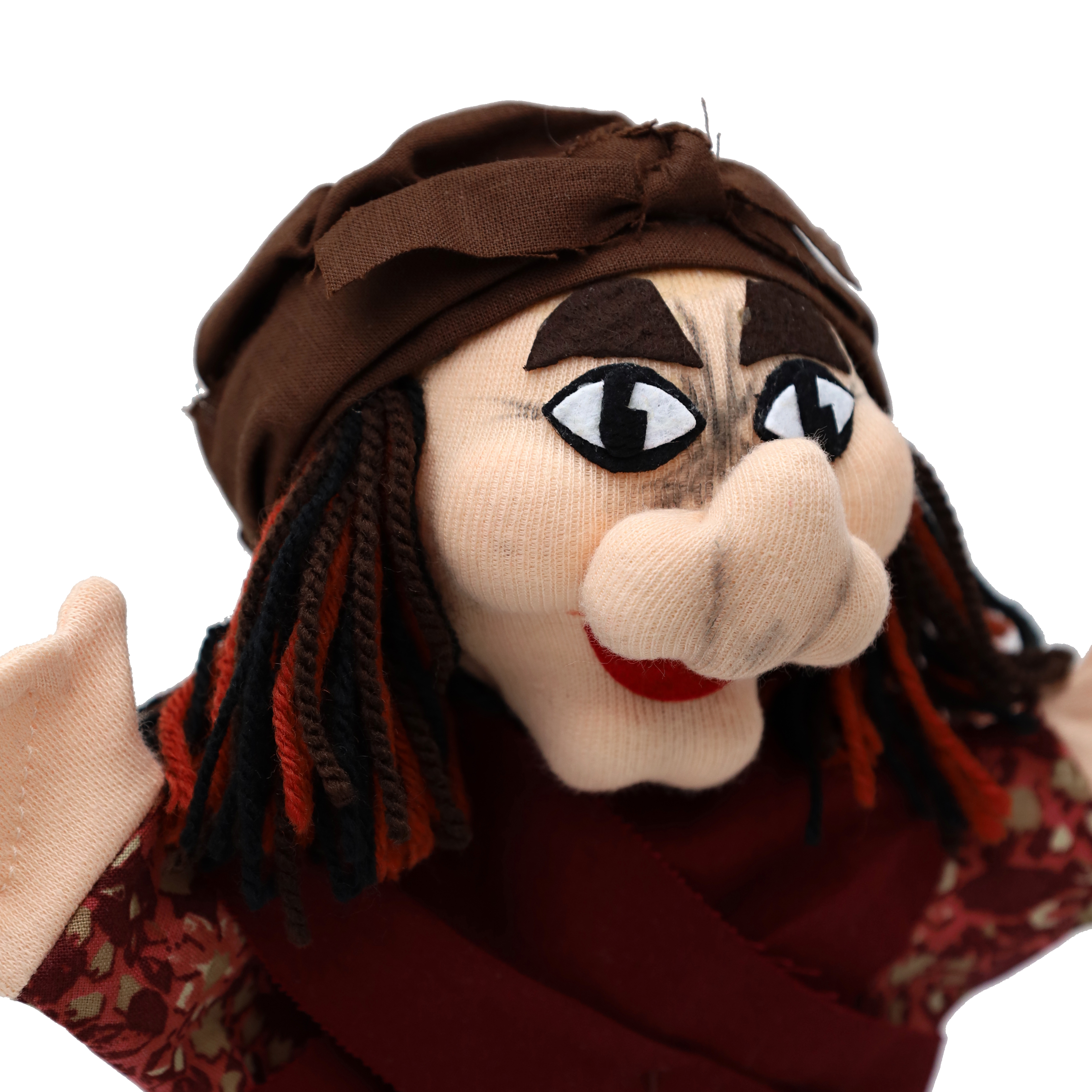 Punch and Judy puppet witch by munabo in close-up with a striking nose, red lips and headscarf