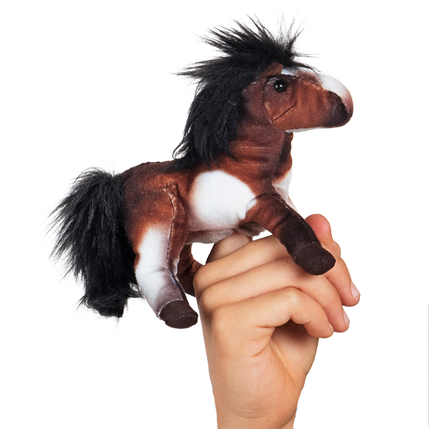 Folkmanis finger puppet mini horse in brown and white with a black mane, worn on an index finger, side view