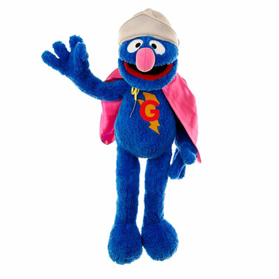 Living Puppets hand puppet Super Grover from Sesame Street with blue fur, a beige helmet and a pink cape with a G emblem, waving